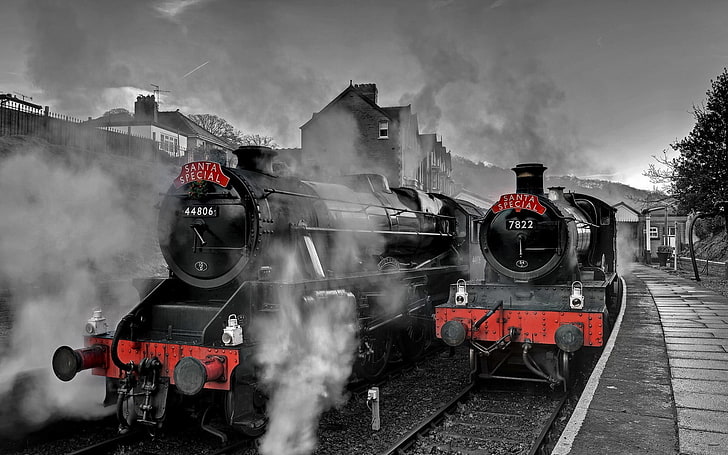 two black-and-red steam locomotive trains, railway, steam locomotive, train, train station, trees, house, hills, santa, selective coloring, HD wallpaper