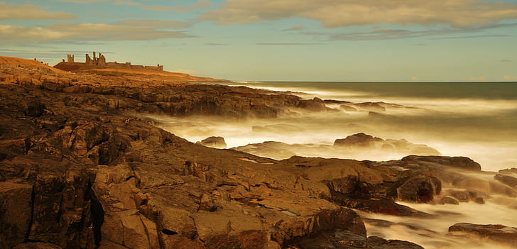 brown mountain during daytime, dunstanburgh castle, dunstanburgh castle, Dunstanburgh Castle, brown mountain, daytime, Dunstanburgh  Castle, Northumberland  coast, holiday, travel, tourism, water, neutral  density  filter, ND, long  exposure, shutter  speed, waves, clear, lines, coastal, walk, path, ride, hike, tour, light, artistic, national  trust, english  heritage, fort, rock, beach, Leeds, Photography, sunset, nature, rock - Object, landscape, sea, scenics, famous Place, sunrise - Dawn, HD wallpaper