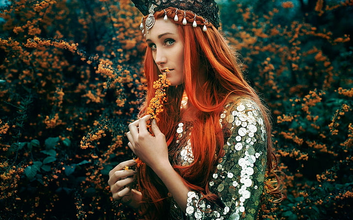 women's green and gray sequined top, photo of woman with red hair holding brown clustered flower, women, model, redhead, long hair, women outdoors, nature, plants, green, looking at viewer, flowers, blue eyes, face, pearls, headband, leaves, Bella Kotak (Photographer), HD wallpaper