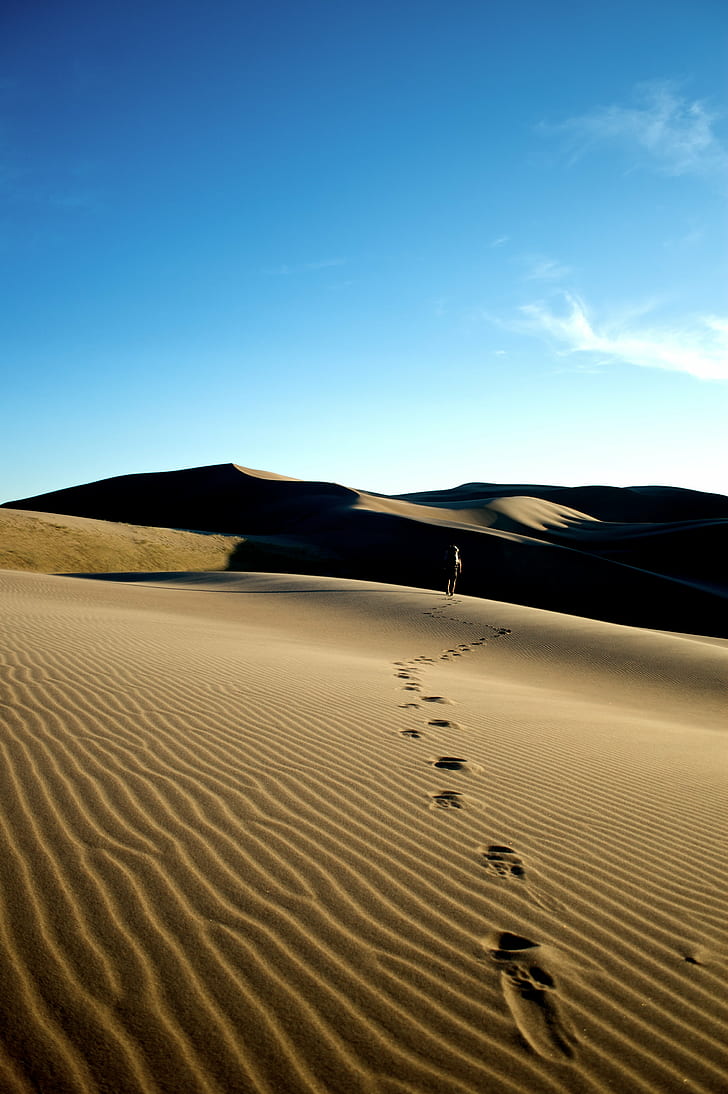 person walking on desert leaving footsteps during daytime, Footsteps, person, walking on, desert, daytime, Hiking, colorado, sand  dunes, national  park, mountains, colorful, backpacking, sand Dune, sand, nature, dry, landscape, arid Climate, scenics, no People, sky, outdoors, extreme Terrain, HD wallpaper