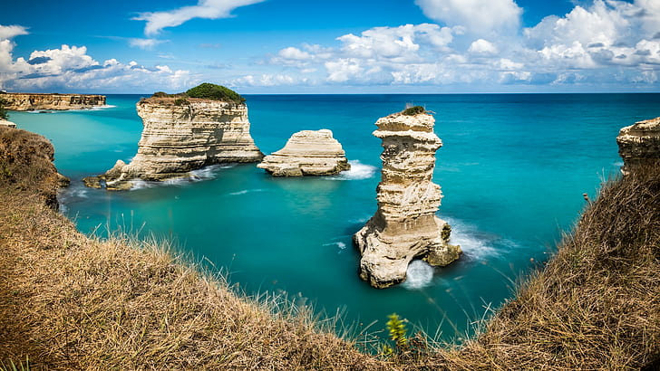 rock monolith surrounded by body of water under blue sky, Torre, puglia, italy, Torre, puglia, italy, Torre, di, Puglia, Italy, Seascape, photography, rock, monolith, body of water, blue sky, grass, natural, calm, peaceful, nature, italy, beauty, sea, summer, art, geotagged, salento, photo, tranquil, prints, landscape, lecce, puglia, italia, european, shore, scenic, outdoor, fine art, coast, view, clouds, long exposure, blue, photograph, scenery, beautiful, travel, cloud  print, outdoors, colorful, green, europe, depth, horizontal, cliff, coastline, scenics, rock - Object, beach, HD wallpaper