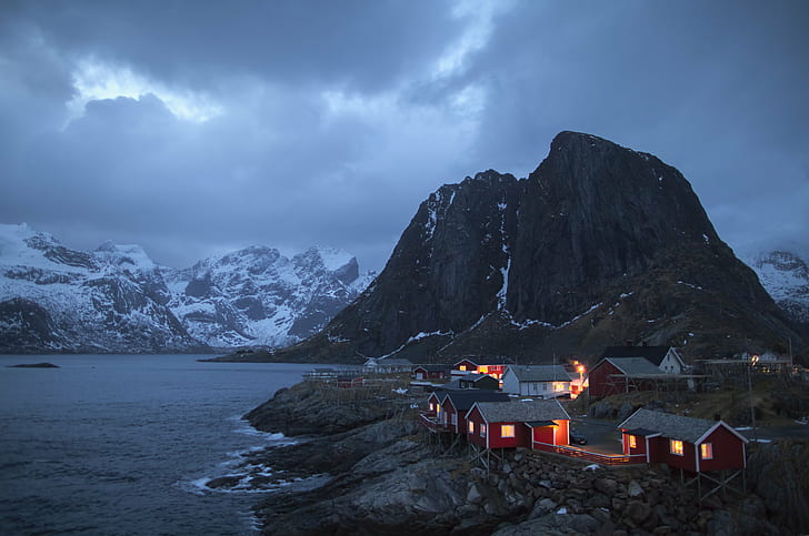 houses near body of water with mountains, Nightfall, houses, body of water, mountains, Hamnoy, Lofoten, Nordland, Norge, Norway, Norwegen, evening, dusk, blue hour, scenic, winter, outdoors, sea, atlantic  ocean, cabin, fisherman, beauty, wild, wilderness, clouds, canon 5D, eos, ice, HDR, arctic, dramatic, light, north, cold  water, mountain, snow, nature, fjord, landscape, scenics, HD wallpaper