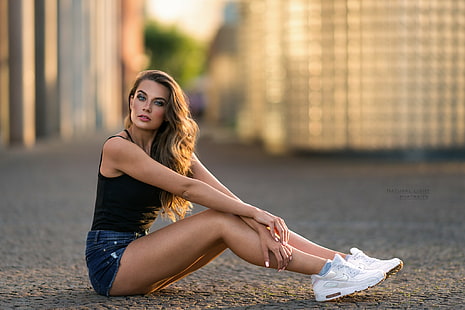 women, sitting, jean shorts, sneakers, tanned, depth of field, Lucie Syrohova, brunette, looking at viewer, tank top, HD wallpaper HD wallpaper