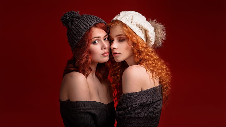 Anastasia Zhilina, two women, looking at viewer, redhead, curly hair, long hair, side view, woolly hat, Knit Fabric, knit hat, sweater, bare shoulders, portrait, women, red background, simple background, Alexandr Chuprina, HD wallpaper