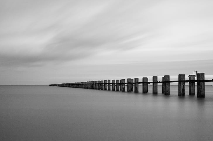 gray sea dock, look back, Out to Sea, East Beach, gray, dock, pier, water, seaside, long exposure, black and white, white  canon, drift, posts, breakwater, bw, shoeburyness, photography, clouds, weather, sea, nature, wood - Material, jetty, beach, sky, HD wallpaper
