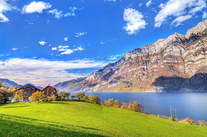 brown painted house with green grass field near calm body of water with mountain as background under the blue sky, Calm, place to live, brown, painted house, green grass, body of water, mountain, background, under the blue sky, sky  lake, walensee, grass, meadow  house, trees, fog, sky  blue, clouds, hdr, photomatix, wideangle, nikon  d300, quiet, swiss, beautiful, curves, autumn, autumnal, fall, switzerland, quarten, World Photography Awards, nature, european Alps, lake, europe, summer, landscape, scenics, outdoors, HD wallpaper