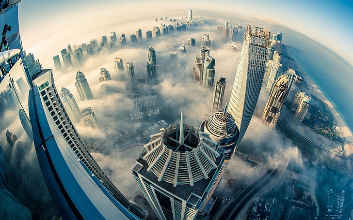 skyscrapers scenery, fisheye photo of gray high rise buildings at daytime, Dubai, clouds, building, city, sea, urban, architecture, photography, skyscraper, cityscape, mist, aerial view, fisheye lens, heights, HD wallpaper