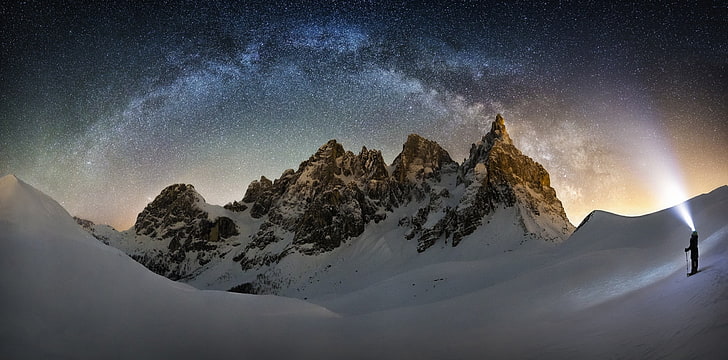 brown rock mountains, nature, landscape, Milky Way, snow, mountains, snowy peak, starry night, skiers, spotlights, long exposure, galaxy, HD wallpaper
