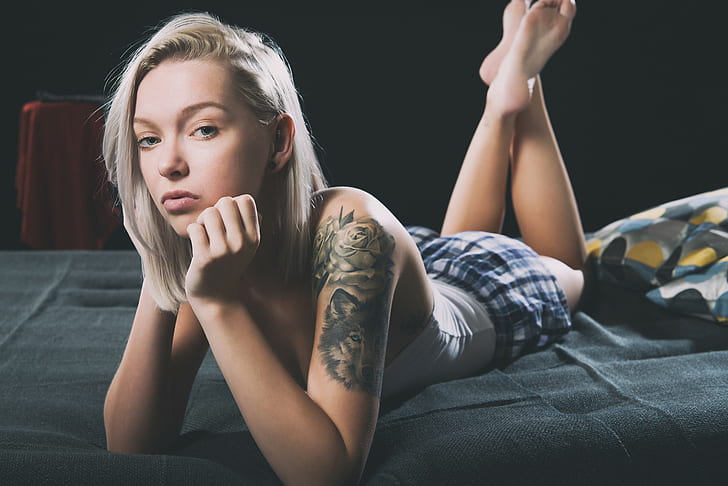 women, model, blonde, in bed, looking at viewer, tattoo, skirt, face, inked girls, legs up, barefoot, HD wallpaper