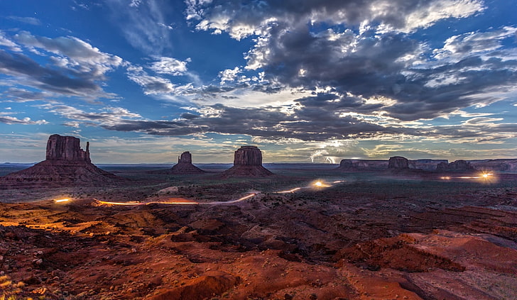 landscape photography of brown rock formation under white clouds, Arizona, lightning, rock, erosion, clouds, traffic lights, panoramas, nature, landscape, Monument Valley, rock formation, HD wallpaper