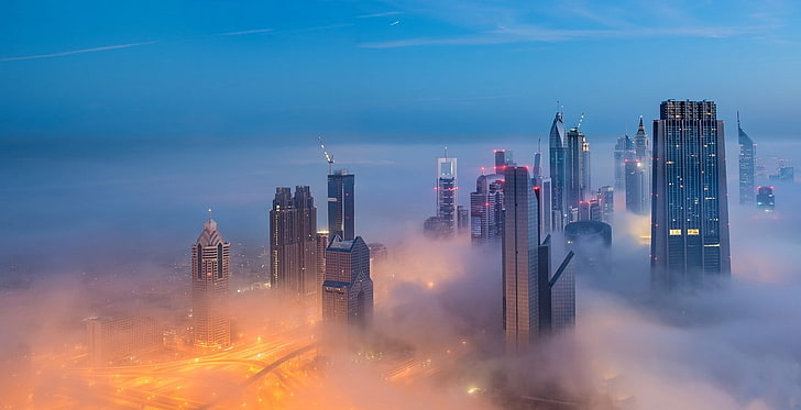 high-rise buildings covered by fog under blue sky, photography, landscape, Dubai, mist, skyscraper, architecture, evening, lights, urban, modern, United Arab Emirates, HD wallpaper