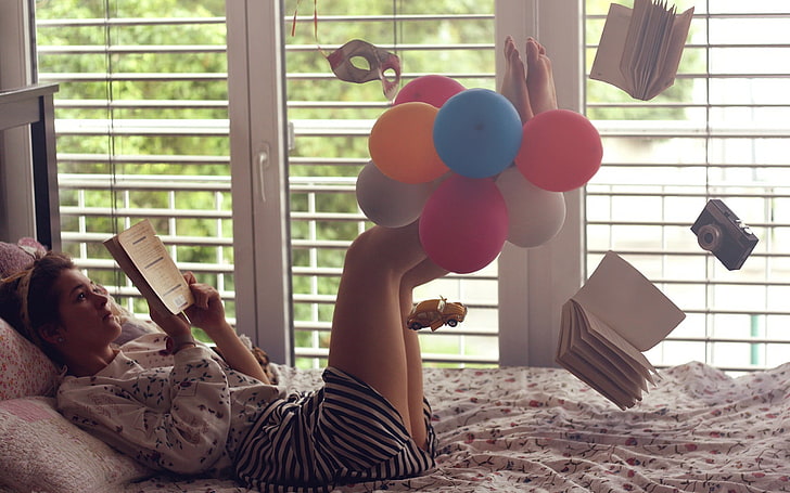 women, balloon, floating, reading, bed, window, books, barefoot, camera, striped clothing, venetian masks, toys, car, legs up, HD wallpaper