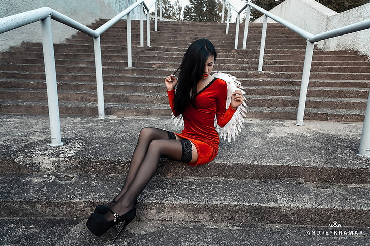 women's red V-neck long-sleeved mini dress, women, model, red dress, high heels, black stockings, sitting, stairs, black hair, angel, wings, skinny, Andrey Kramar, HD wallpaper
