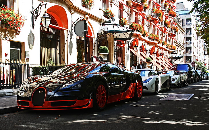 red and black Bugatti Veyron beside concrete structure, car, Bugatti, Bugatti Veyron, Koenigsegg, Koenigsegg Agera, Pagani, Pagani Zonda, city, vehicle, HD wallpaper