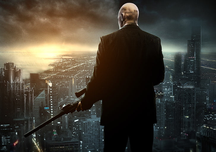 man holding assault rifle on top of building digital wallpaper, the city, weapons, home, barcode, bald, jacket, megapolis, sniper rifle, Agent 47, Hitman Absolution, forty-seventh, assassin, Hitman Sniper Challenge, HD wallpaper