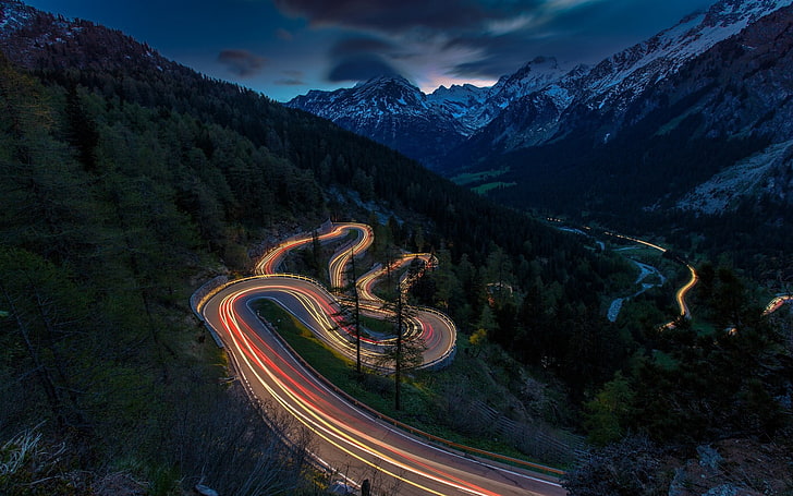 lighted winding road, nature, landscape, mist, mountains, forest, road, lights, traffic lights, snowy peak, Switzerland, sunset, HD wallpaper