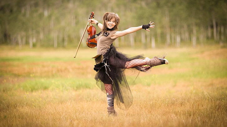 woman wearing black lace crew-neck top and tutu skirt holding violin and bow with hands stretching out, Lindsey Stirling, violin, women, celebrity, HD wallpaper