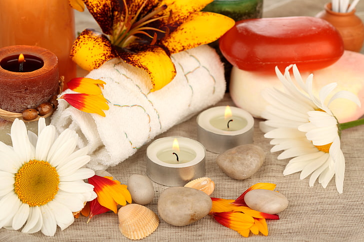 two tealight candles and several stones, flowers, stones, chamomile, candles, petals, soap, shell, towels, Spa, HD wallpaper