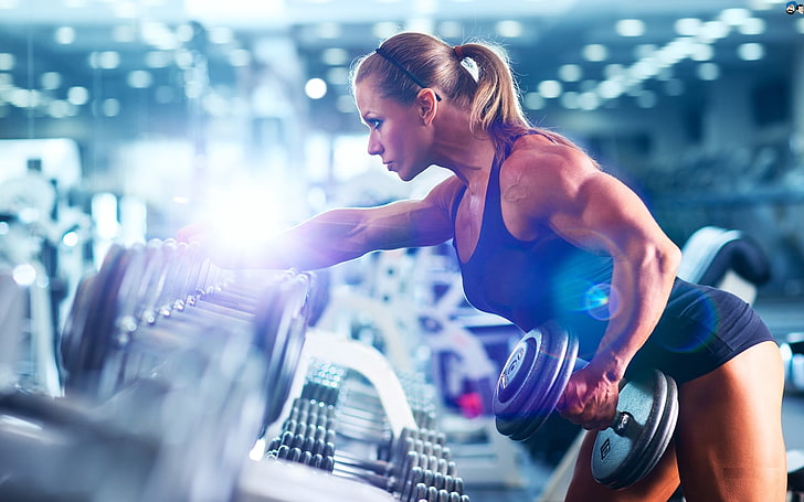 woman holding dumbbell in focus photography, muscles, blonde, fitness, dumbbells, bodybuilder, HD wallpaper
