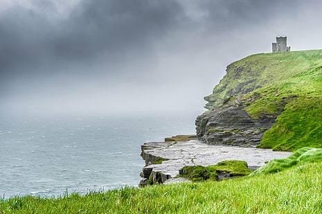 brown rock cliff near body of water, liscannor, ireland, liscannor, ireland, oh, Moher, Liscannor, body of water, by the sea, cliffs, clouds, europe, grass, history  ireland, landscape, sel2870, sky, sony a7, tower, travel, trip, sea, lighthouse, coastline, nature, rock - Object, cliff, HD wallpaper HD wallpaper