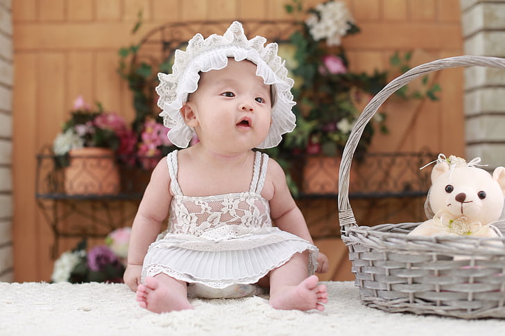 baby girl wearing dress sitting beside a basket with bear plush toy, Cute baby girl, Teddy bear, Basket, 5K, HD wallpaper
