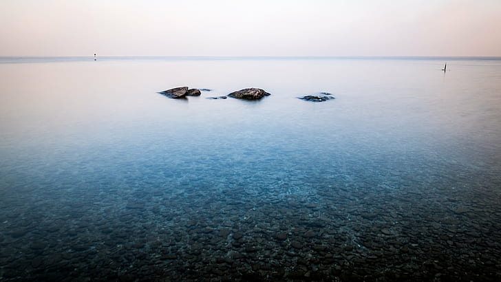 calm body of water during daytime, garda lake, sirmione, italy, garda lake, sirmione, italy, Rocks, Garda lake, Sirmione, Italy, Fine art photography, calm, body of water, daytime, natural  color, print, nature, italia, lake, contrast, mysterious, outside, photography, art, geotagged, white, photo, tranquil, prints, landscape, winter, european, outdoor, landscapes, foggy, garda, peaceful, blue, photograph, vacation, beautiful, travel, coast, fine art, depth, canvas, fog, symmetrical, europe, outdoors, horizontal, sea, water, beach, HD wallpaper