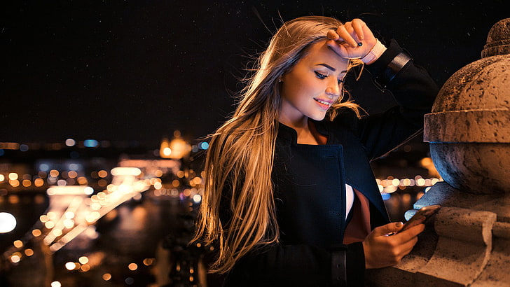 women, blonde, smiling, coats, cellphone, Peter Paszternak, Maria Puchnina, black coat, long hair, women outdoors, hands on head, glamour women, Mary Jane, touching hair, straight hair, Chain Bridge, Budapest, open mouth, pink lipstick, black nails, reading, open clothes, standing, touching face, HD wallpaper