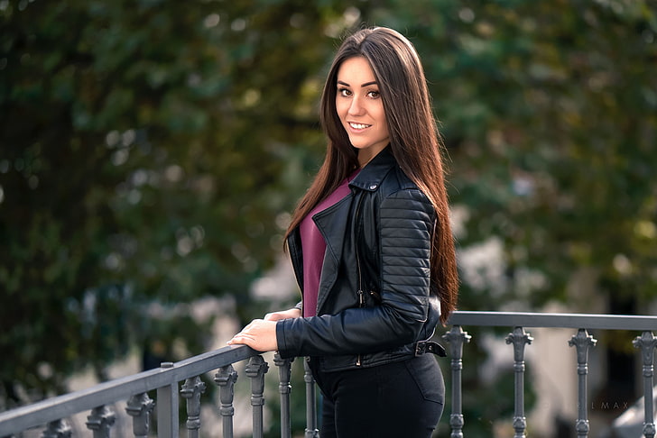 woman in black leather zip-up jacket near railings, women, portrait, smiling, depth of field, leather jackets, women outdoors, balcony, jeans, jacket, looking at viewer, brown eyes, model, long hair, straight hair, open mouth, Lenka, Cyril Max, HD wallpaper