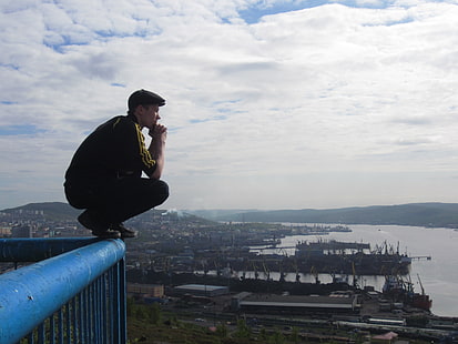 man squatting on blue fence, cityscape, city, Slav squat, squatting, harbor, HD wallpaper HD wallpaper