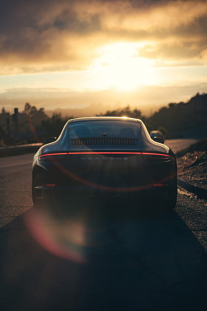 Porsche, coche deportivo, vista trasera, negro, luz solar, movimiento, Fondo de pantalla HD, fondo de pantalla de teléfono