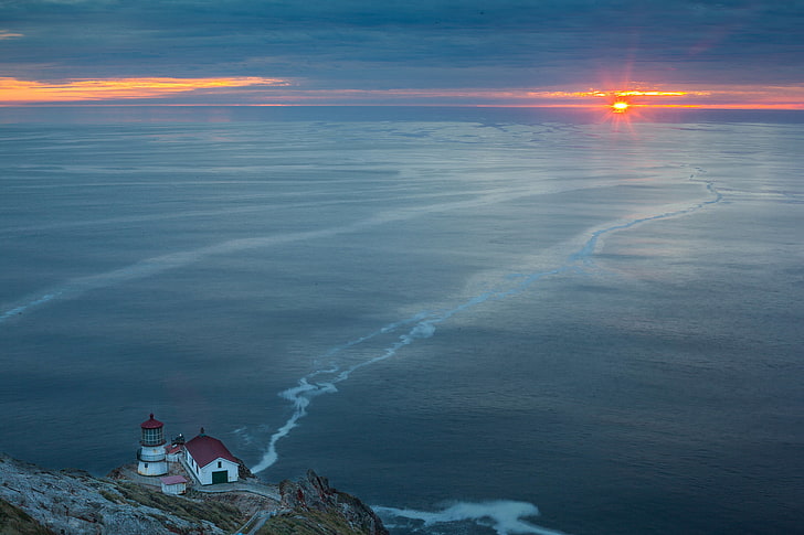 lighthouse near slope edge photography, sea, landscape, sunset, lighthouse, HD wallpaper