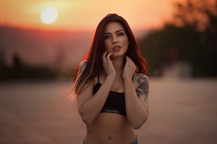 girl, twilight, long hair, brown eyes, photo, sunset, photographer, model, sun, tattoo, bokeh, lips, face, brunette, top, belly, tummy, hips, portrait, navel, mouth, wavy hair, Calvin Klein, open mouth, strap, lipstick, looking at camera, depth of field, pierced navel, bare shoulders, looking at viewer, Robert Chrenka, black top, touching face, HD wallpaper