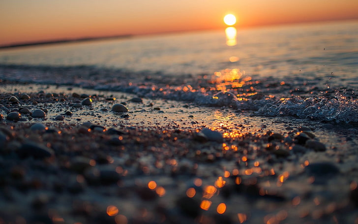 pebble stone and body of water, seashore photo taken during golden hour, tilt shift, beach, sunset, HD wallpaper