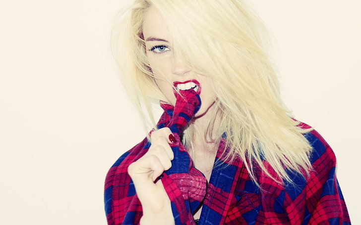 women's red and blue plaid shirt, Amber Heard, biting, blonde, actress, long hair, looking at viewer, simple background, HD wallpaper