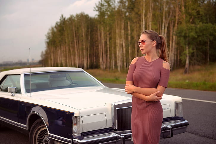 Eva Lunichkina, women, model, brunette, long hair, women with cars, ponytail, profile, looking into the distance, arms crossed, nipples through clothing, dress, tight dress, depth of field, trees, Cadillac, car, outdoors, women outdoors, HD wallpaper