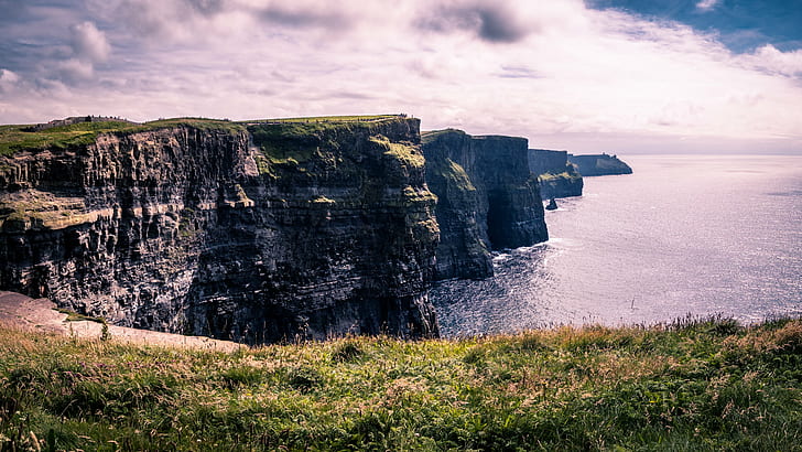 landscape photography of mountain near body of water, clare, ireland, clare, ireland, Cliffs of Moher, panorama, Clare, Ireland, Landscape photography, mountain, body of water, grass, natural  landscape, landmark, outdoor, rocks, travel, tower, water, seascape, popular, nature, sea, County Clare, IE, cliff, rock - Object, coastline, scenics, landscape, HD wallpaper
