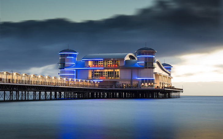 photo of white building on dock, landscape, water, building, England, UK, pier, sea, evening, lights, clouds, horizon, long exposure, HD wallpaper