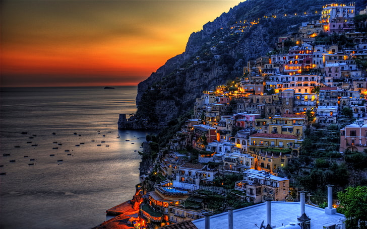landmark city, sea, sunset, mountains, lights, rocks, coast, home, boats, the evening, Italy, glow, Positano, HD wallpaper
