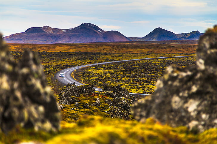 green mountain near gray concrete road with a white car during day time, green mountain, gray, concrete road, white, car, day, time, peninsula, snaefellsnes, islandia, nature, iceland, mountain, volcano, landscape, travel, outdoors, scenics, lava, summer, sky, volcanic Landscape, HD wallpaper