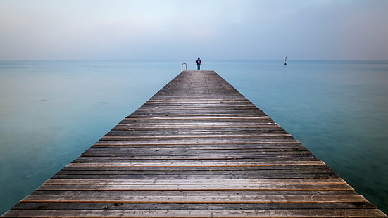 person standing on wooden dock during daytime, garda lake, sirmione, italy, garda lake, sirmione, italy, Girl, Garda lake, Sirmione, Italy, Fine art photography, person, wooden, dock, daytime, natural  color, calm, print, nature, reflection, italia, lake, mysterious, outside, photography, sky, yellow, geotagged  photo, canvas  prints, winter, pier, european, outdoor, landscapes, wood, coast, view, fine art, blue, photograph, tranquil, beautiful, travel, peaceful, water, scenic, brown, outdoors, horizontal, europe, depth, portfolio, sea, jetty, wood - Material, boardwalk, beach, summer, tranquil Scene, HD wallpaper HD wallpaper