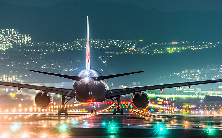 gray airplane, white airplane at airport during nighttime, landscape, night, airplane, lights, airport, hills, runway, Japan, Osaka, wings, turbine, cityscape, rear view, passenger aircraft, HD wallpaper