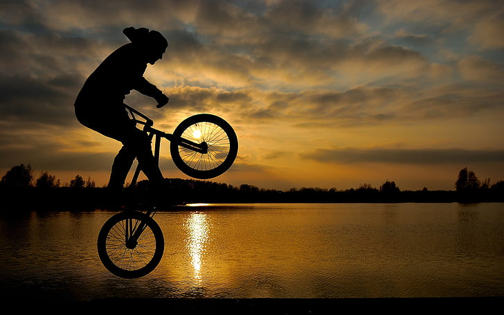 Bicycle Silhouette Sunset Lake Jump HD, nature, sunset, lake, jump, silhouette, bicycle, HD wallpaper