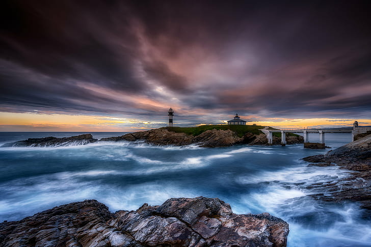 lighthouse on island connected with white bridge on sea under dramatic clouds, lighthouse, II, island, white bridge, sea, dramatic, clouds, landscape, sunset, flickr, travel, faros, amazing, beautiful, wow, sunrise  river, water, nature, rock - Object, dusk, coastline, night, HD wallpaper