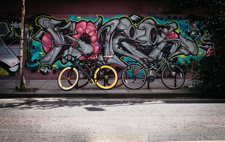 art, bicycles, bikes, color, colorful, colourful, creative, graffiti, parked, pavement, plant, road, shadow, sidewalk, street, texture, transportation system, vehicle, wall, wheel, HD wallpaper