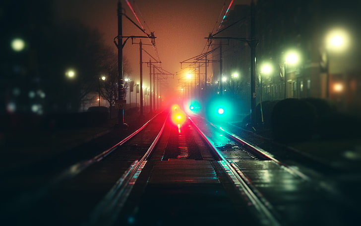 bokeh photography of train railway, blurred, railway, night, lights, road, transport, train, HD wallpaper
