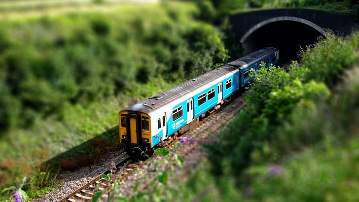 blue and white train, selective focus photography of miniature train, train, nature, blurred, tilt shift, toys, HD wallpaper