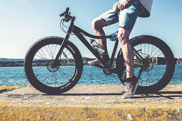 black fat bike, cyclist, legs, bicycle, river, HD wallpaper