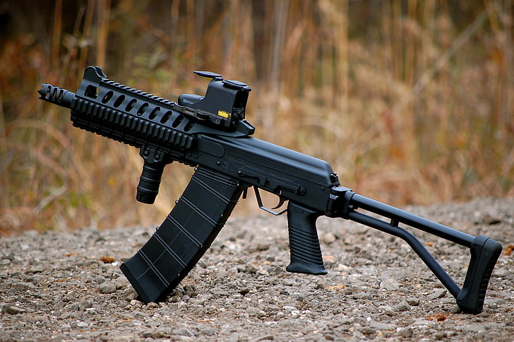 black SMG rifle with scope, grass, the gun, gravel, self-loading, Saiga-12, smoothbore, HD wallpaper