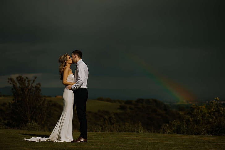 adult, affection, bride, clouds, couple, dark, dramatic, dress, field, girl, grass, groom, hill, kissing, landscape, love, man, marriage, outdoors, people, rainbow, romantic, sky, together, togetherness, trees, wear, weddi, HD wallpaper