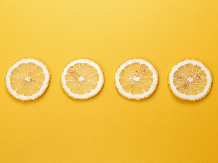 четыре ломтика цитрусовых, желтый фон, фрукты, лимоны, минимализм, HD обои